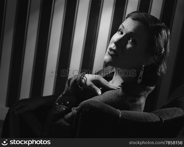 Hollywood black and white, a beautiful woman - minimal lighting and strong contrast