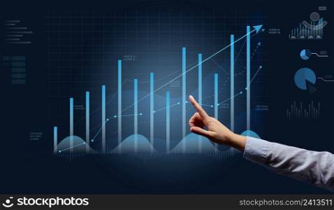 Holographic graph with growing indicators and a woman’s hand. Business growth concept, profitable startup, profitable business strategy