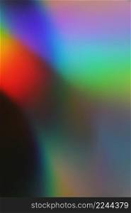 Holographic real texture in blue pink green colors with scratches and irregularities. Holographic rainbow foil abstract background.. Holographic real texture in blue pink green colors with scratches and irregularities. Holographic color wrinkled foil.