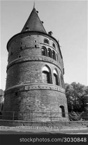 Holstentor (Holsten Gate) in Luebeck bw. Holstentor (previously Holstein Tor, meaning Holsten Gate) in Luebeck, Germany in black and white