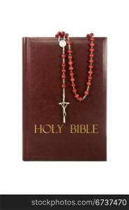 holy bible with rosary isolated on white background