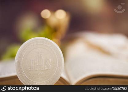 Holy communion a golden chalice with grapes and bread wafers. Sacrament of communion, Eucharist symbol