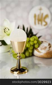 Holy Communion Bread, Wine for christianity religion. Holy communion a golden chalice with grapes and bread wafers