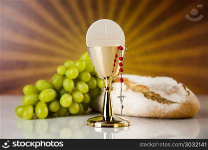 Holy Communion Bread, Wine for christianity religion. Holy communion a golden chalice with grapes and bread wafers