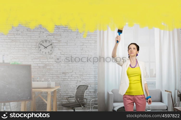 Home and house renovation mixed media. Woman with a painting roller or brush in renovate interior