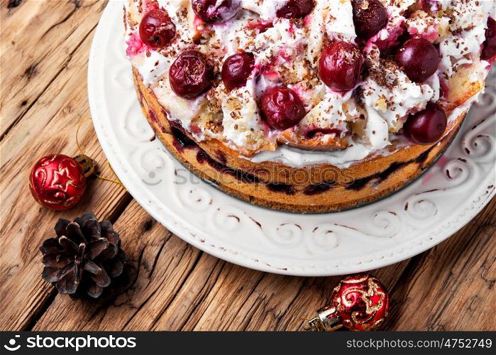 home christmas pie with cherry in rustic style. Christmas cherry pie