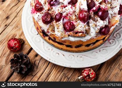 home christmas pie with cherry in rustic style. Christmas cherry pie