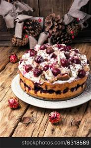 home cream pie with cherry in a rustic style. Christmas cherry pie