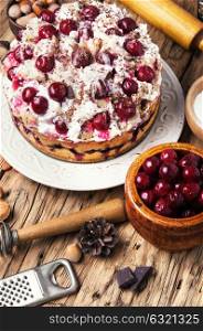 home cream pie with cherry in a rustic style. pie with cherry