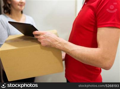 home delivery service, mail, people and shipping concept - man with tablet pc computer delivering parcel box to customer. delivery man with box, tablet pc and customer