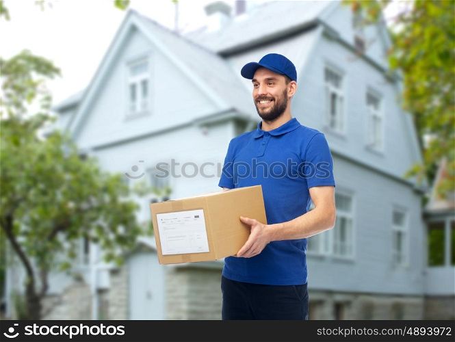 home delivery service, mail, people, logistics and shipping concept - happy man with parcel box over house background
