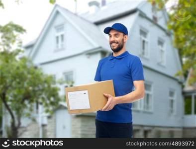 home delivery service, mail, people, logistics and shipping concept - happy man with parcel box over house background