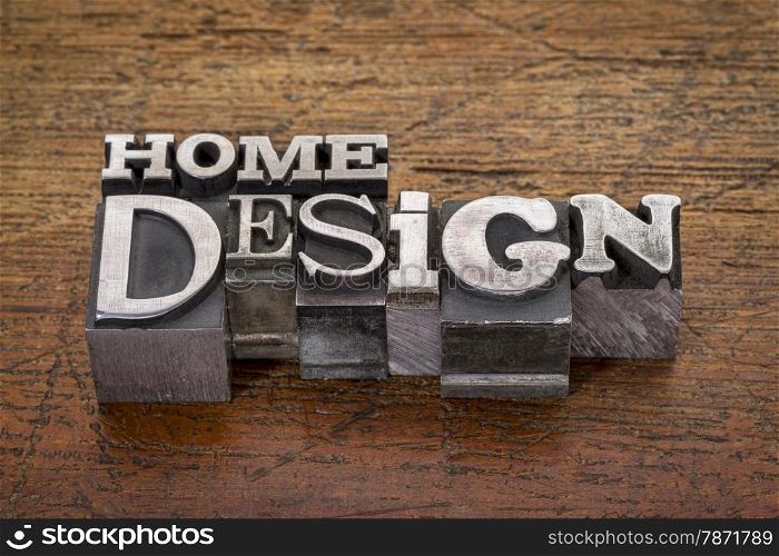 home design text in mixed vintage metal type printing blocks over grunge wood