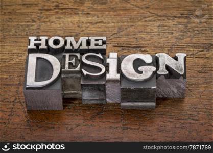 home design text in mixed vintage metal type printing blocks over grunge wood