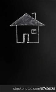 Home drawn in chalk on a blackboard