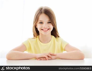 home, happiness and people concept - beautiful little girl at home