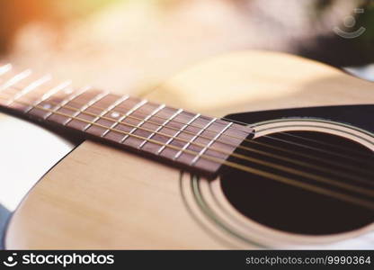 Home hobbies - Close up acoustic guitar Musical instrument for recreation or hobby passion concept.