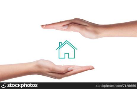 Home insurance concept.Photo of a hand hovering over a house icon