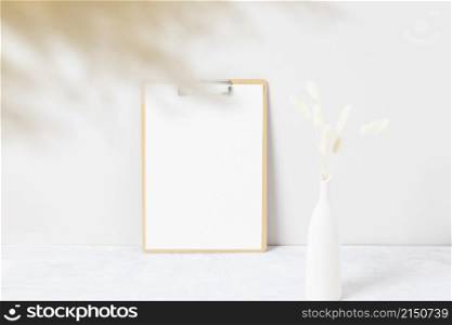 Home interior floral decor, pampas grass on table, Front view, Blank paper cards, Greeting card Mockup. Beautiful white pampas grass in vase on white background