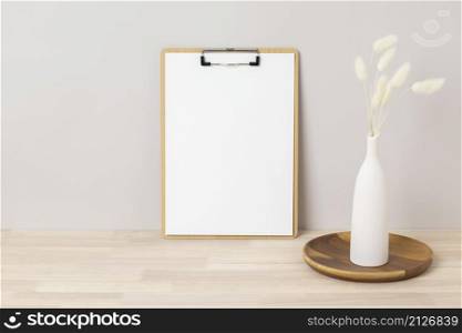 Home interior floral decor, pampas grass on table, Front view, clipboard, Greeting card Mockup. Beautiful white pampas grass in vase on white background