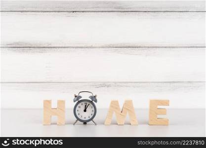 home lettering with wooden letters clock