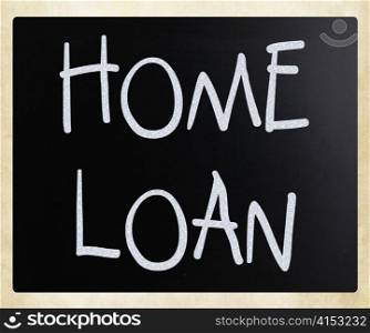 ""Home loan" handwritten with white chalk on a blackboard"