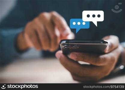 Home office scenario man on smartphone chats live, exploring social network concepts. Chat box icons emerge, symbolizing modern communication and social media marketing.. Young man using smart phone,Social media