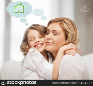 home, real estate and family concept - mother and daughter with eco house
