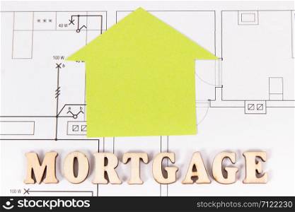 Home shape on electrical diagrams, concept of mortgage loan for buying house. Home shape on electrical diagrams, mortgage loan for buying house concept