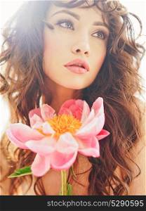 Home stylish fashion photo of beautiful young woman with peony. Holidays and Events. Valentine&rsquo;s Day. Spring blossom. Summer season.