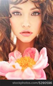 Home stylish fashion photo of beautiful young woman with peony. Holidays and Events. Valentine&rsquo;s Day. Spring blossom. Summer season.