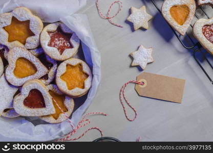 Homebaked Christmas Cookies With fruit Jam filling and Icing Sugar.