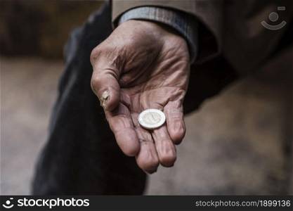 homeless man holding coin his hand. Resolution and high quality beautiful photo. homeless man holding coin his hand. High quality beautiful photo concept