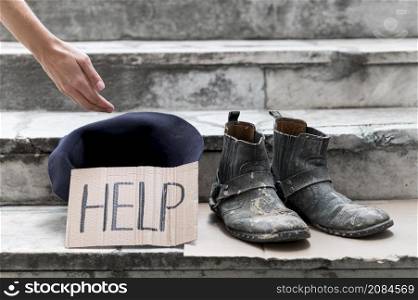 homeless person begging help