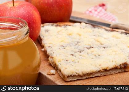 Homemade Apple Pie With Apple Jam in Jar and Apples on Table