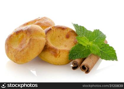 Homemade biscuits with eggs and cream on white background.