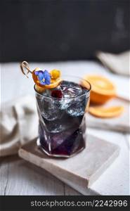 Homemade blueberry italian soda drink in glass.. Homemade blueberry italian soda drink