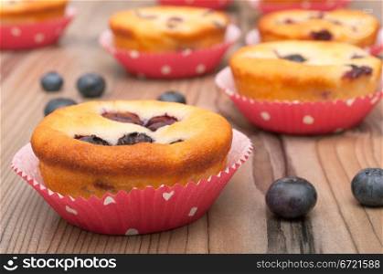 Homemade Blueberry Muffins on Wooden Table
