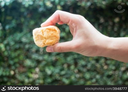 Homemade butter scone on hand, stock photo