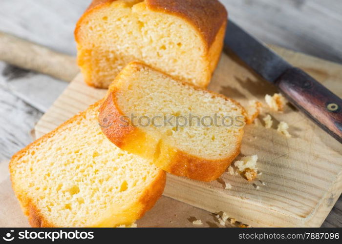 Homemade cake lemon cut on a cutting board