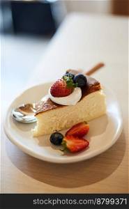 homemade cheesecake on wood table in cafe, selective focus . homemade cheesecake on wood table in cafe