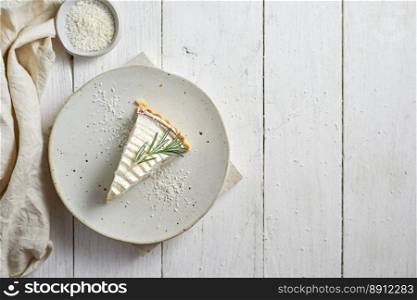 homemade coconut pie on wooden background . homemade coconut pie 