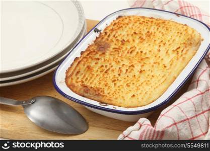 Homemade cottage pie, made with finely chopped cooked meat, onion and carrot, topped with mashed potato and baked until golden. This particular dish is slighly unusual, as it is made with ox tongue rather than minced beef - but it looks the same as any cottage or shepherds pie