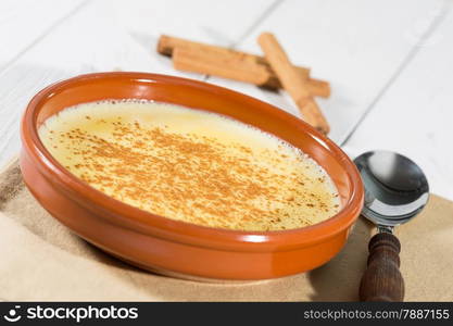 Homemade custard with a little ground cinnamon