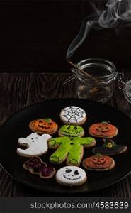 Homemade delicious ginger biscuits for Halloween. Homemade delicious ginger biscuits for Halloween on wooden table