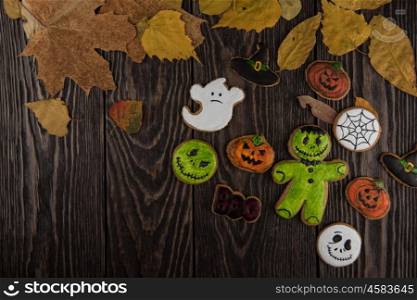 Homemade delicious ginger biscuits for Halloween. Homemade delicious ginger biscuits for Halloween on wooden table