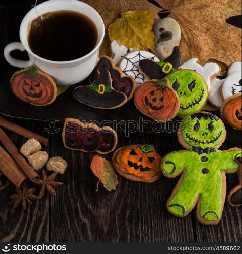 Homemade delicious ginger biscuits for Halloween. Homemade delicious ginger biscuits for Halloween on wooden table