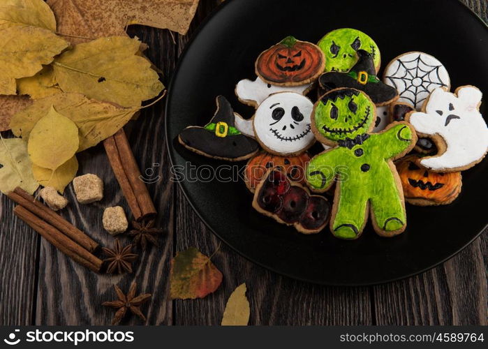 Homemade delicious ginger biscuits for Halloween. Homemade delicious ginger biscuits for Halloween on wooden table