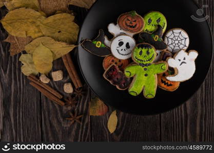 Homemade delicious ginger biscuits for Halloween. Homemade delicious ginger biscuits for Halloween on wooden table