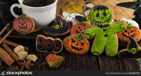 Homemade delicious ginger biscuits for Halloween. Homemade delicious ginger biscuits for Halloween on wooden table